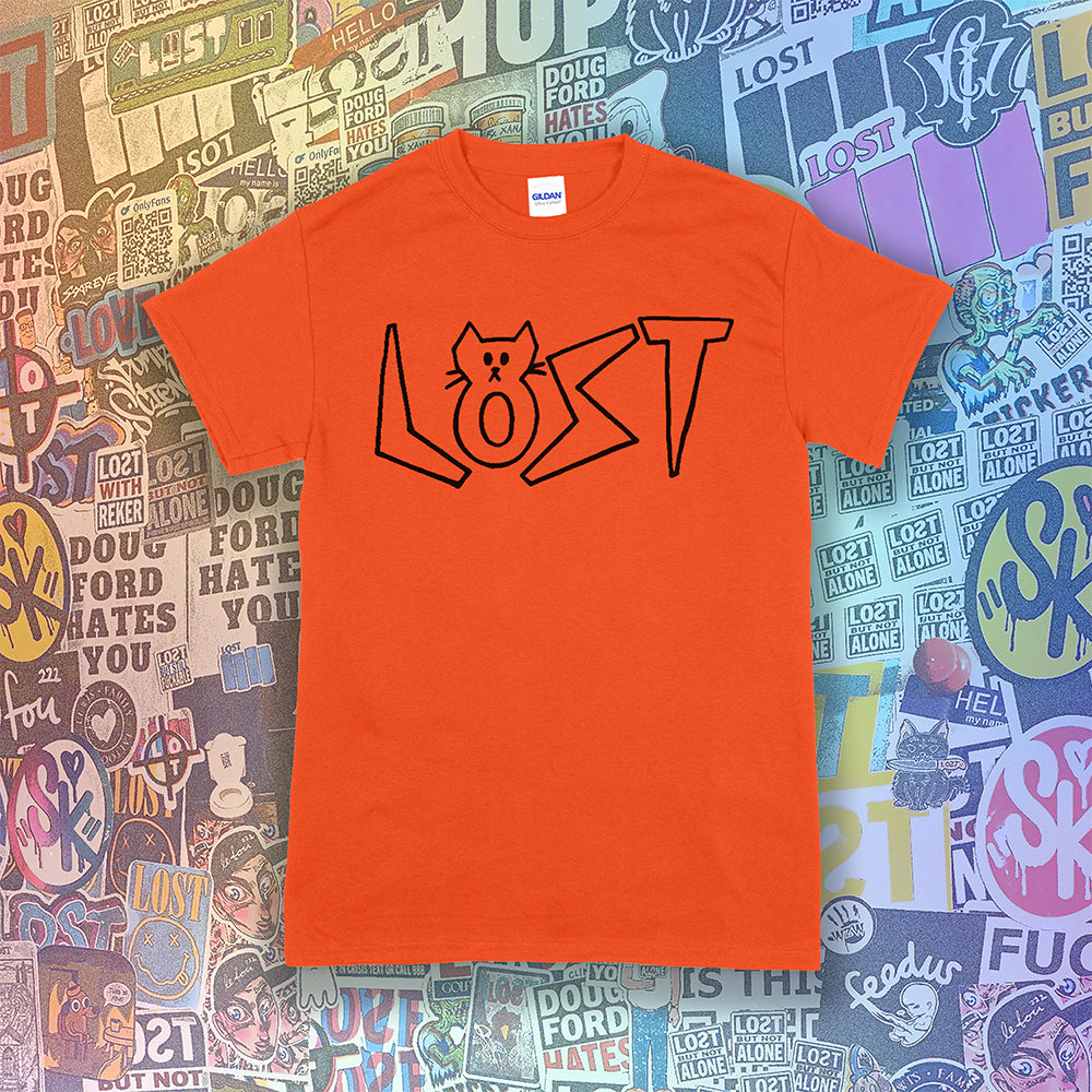 Charlottes Black Cat Letters. Hand drawn design of cat shaped letters. Drawn by my daughter Charlotte, and printed with black ink on an orange shirt. Cool stickers in the background.