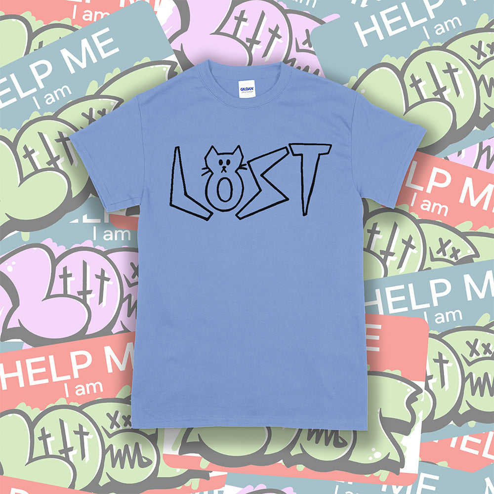 Charlottes Black Cat Letters. Hand drawn design of cat shaped letters. Drawn by my daughter Charlotte, and printed with black ink on a light blue cotton shirt. Lots of cool stickers in the background. 