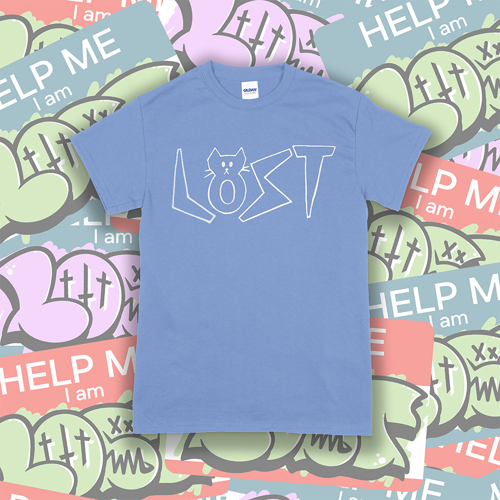 Charlottes Black Cat Letters. Hand drawn design of cat shaped letters. Drawn by my daughter Charlotte, and printed with white ink on a light blue cotton shirt. A collection of colorful graffiti stickers makes up the background. 