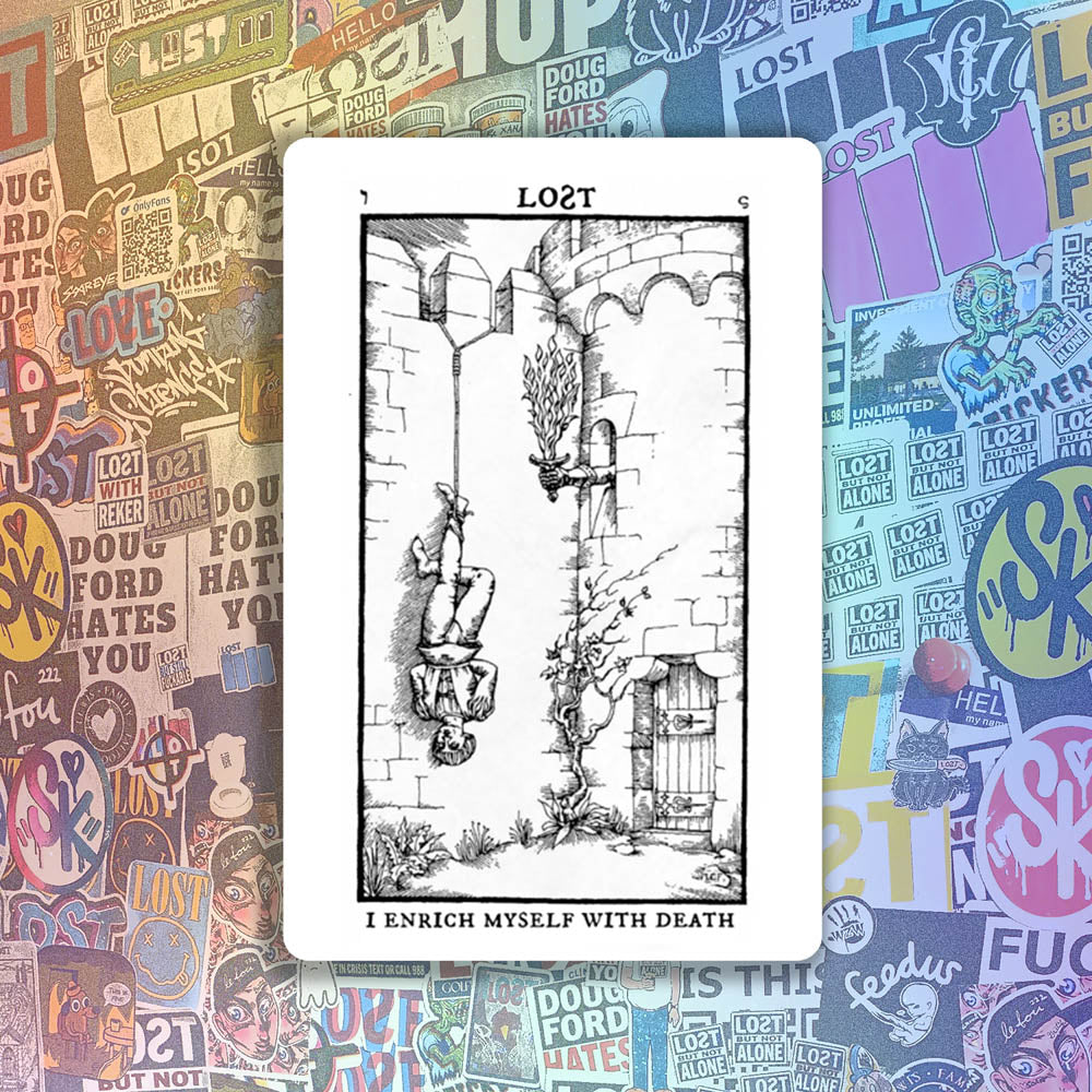 I Enrich Myself With Death thermal sticker by LOST. Black and white design featuring a tarot inspired image of a man hanging upside down. A wall of colorful graffiti stickers provides a unique background for the sticker.
