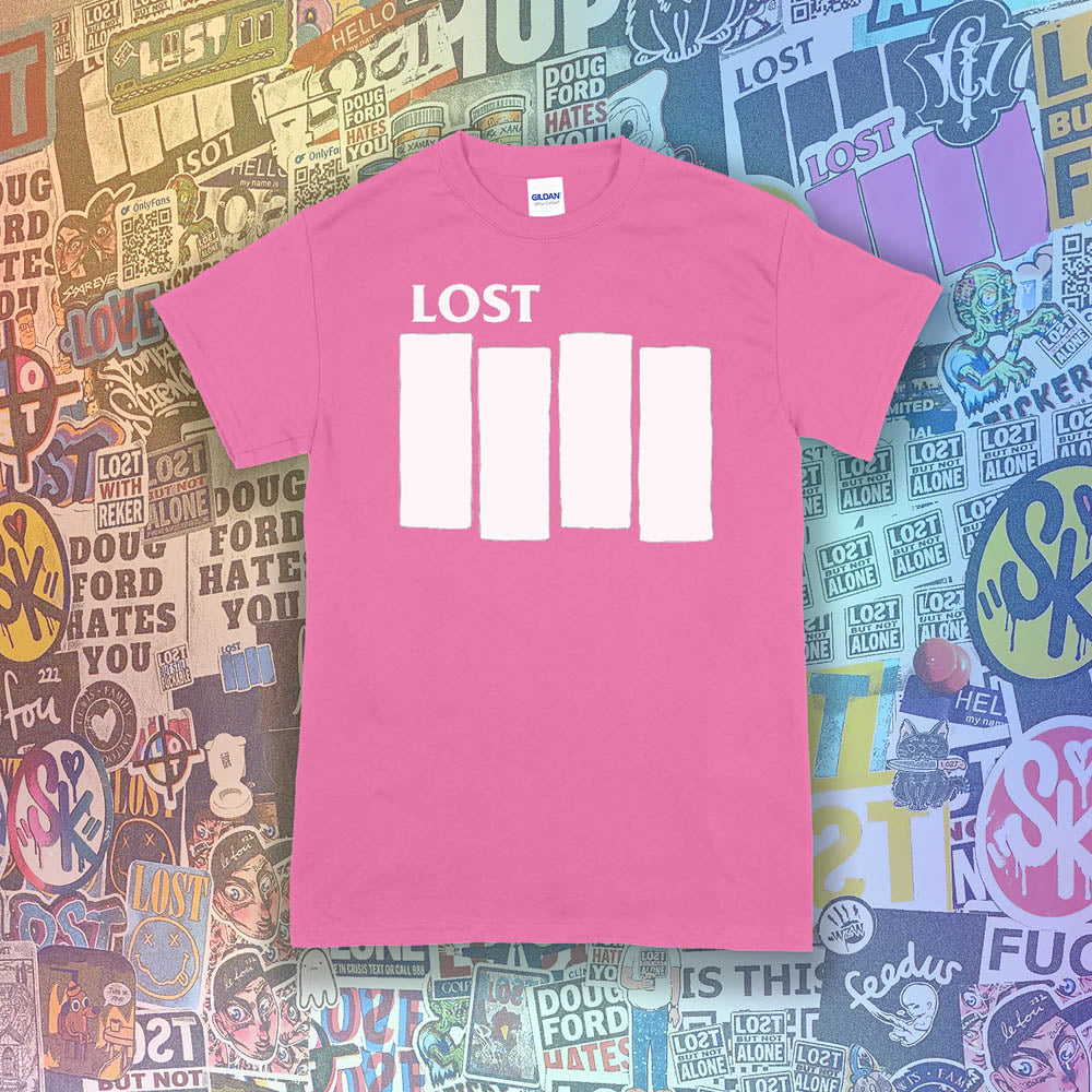 The Lost Flag t-shirt. The iconic bold logo is screen printed in white ink on an azalea pink cotton shirt. A collection of colorful graffiti stickers from artists around the world decorate the background.