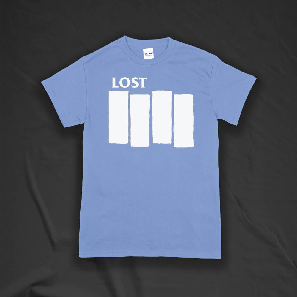 The Lost Flag t-shirt. The iconic bold logo is screen printed in white ink on a light blue cotton shirt.