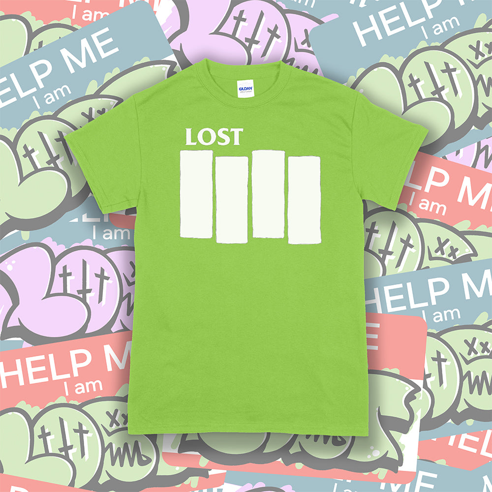 The Lost Flag t-shirt. The iconic bold logo is screen printed in white ink on a lime green cotton shirt. A collection of colorful graffiti stickers make up the background. 