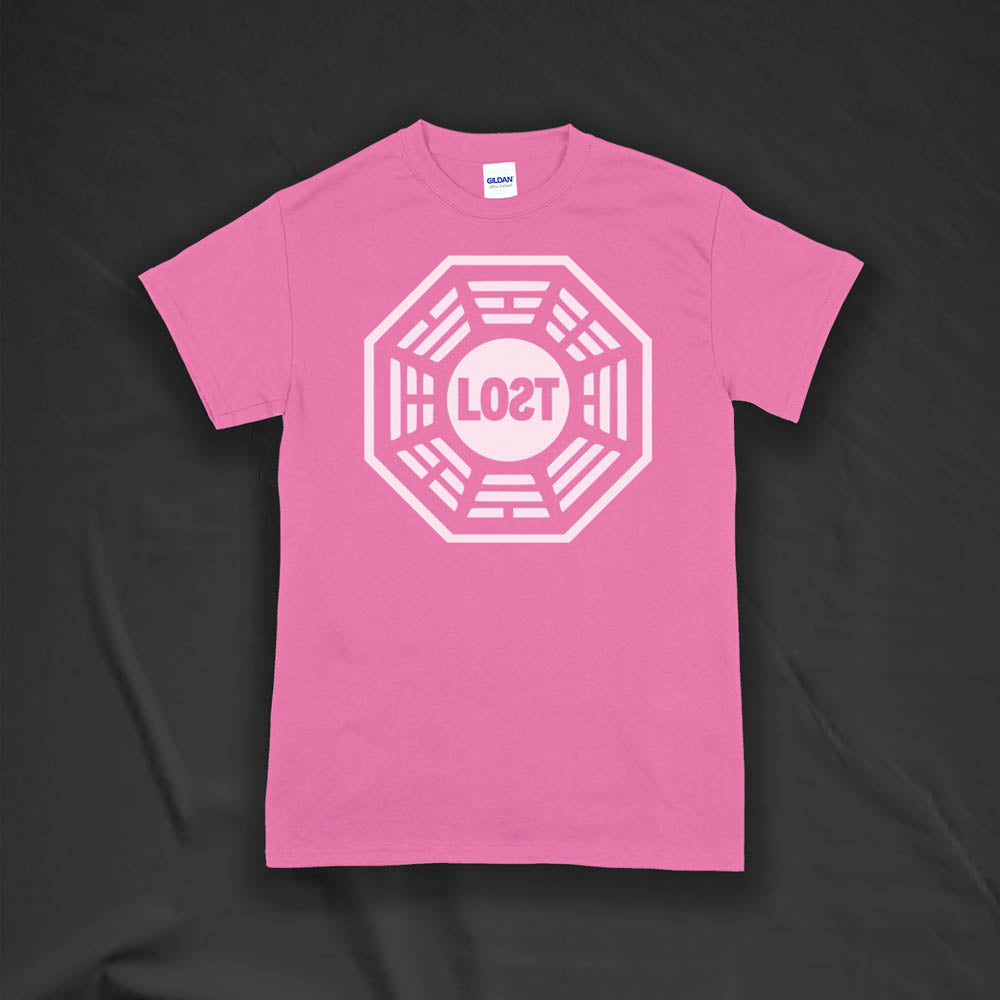 The Lost Initiative t-shirt with a large solid white logo screen printed on a bright pink shirt.