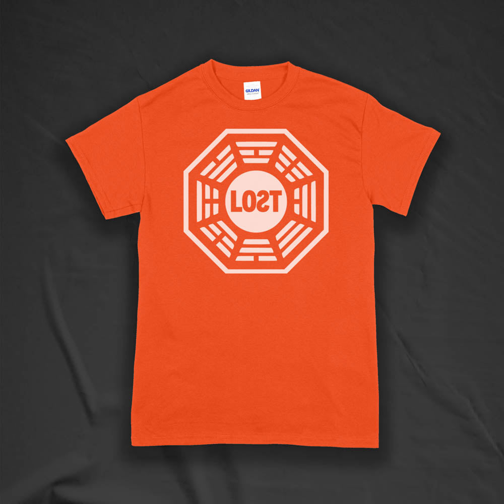 The Lost Initiative t-shirt with a large solid white logo screen printed on a bright orange shirt.