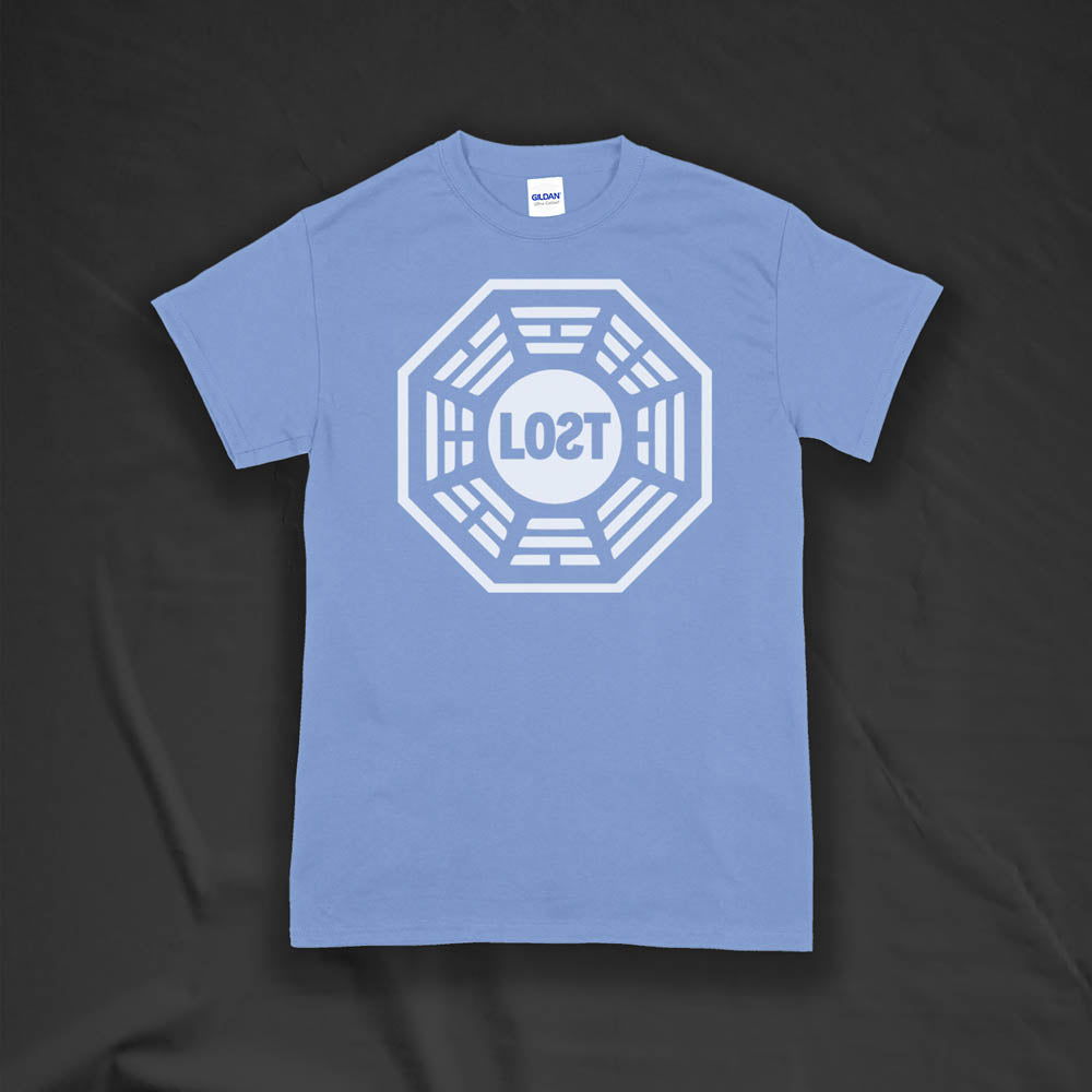 The Lost Initiative t-shirt with a large solid white logo screen printed on a Carolina blue shirt.