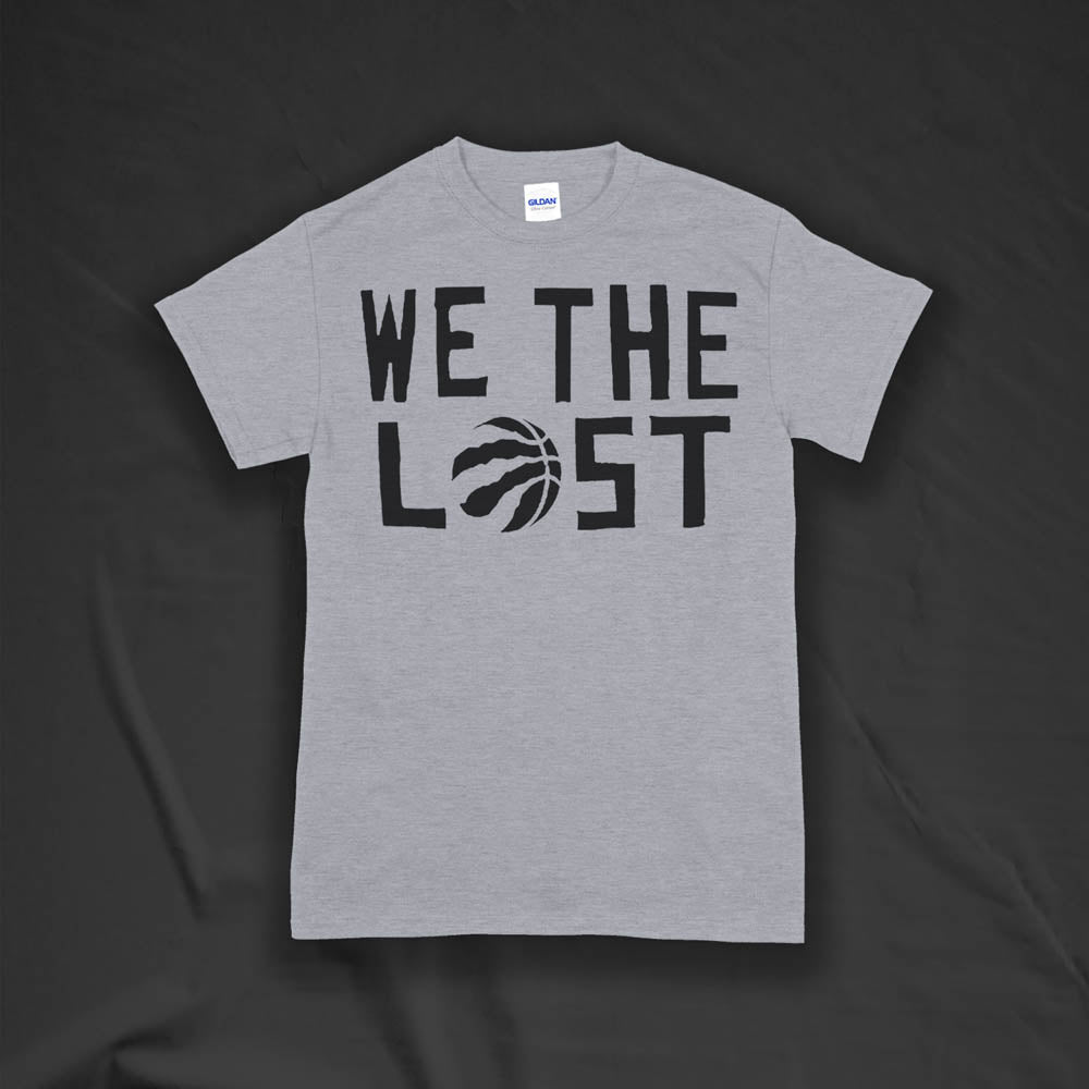 We The Lost t-shirt. Bold black lettering screen printed on a gray shirt. 