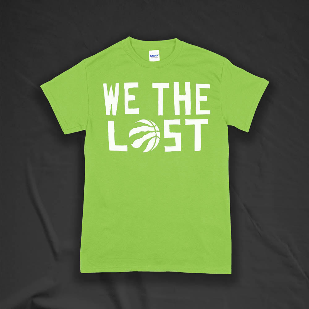 The We The Lost t-shirt. Bold white lettering and raptor claw design screen printed onto a lime green colored shirt. 