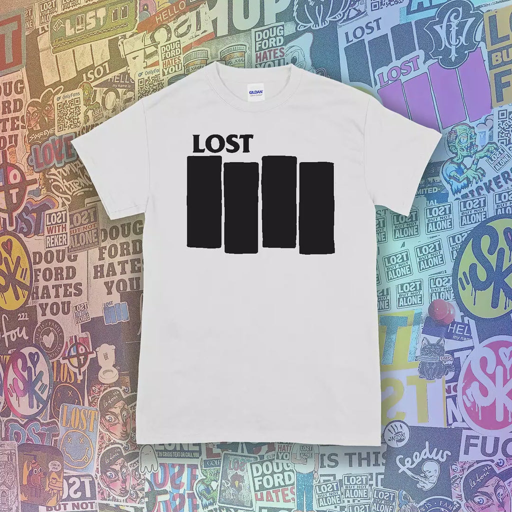 The Lost Flag t-shirt by lost streetwear. A bold and iconic Black logo screen printed on a selection of different colored shirts. The background is a collection of colorful graffiti stickers from artists around the world.