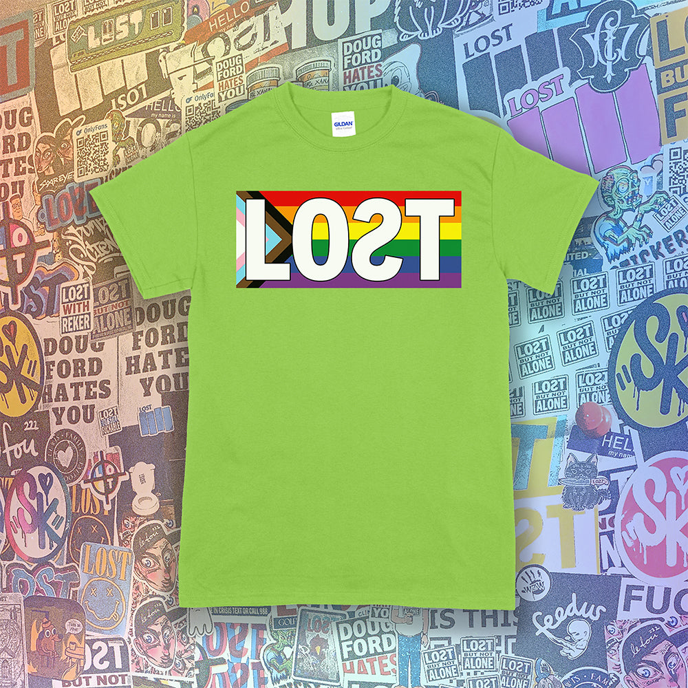 LOST progress flag shirt design by Lost Streetwear. Full color design displayed on a lime green shirt. Graffiti stickers from various artists in the background.